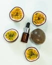 Passion fruit essential oil in a brown glass bottle, alternative medicine. Natural organic essence.