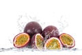 Passion fruit falling in water Royalty Free Stock Photo