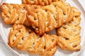 passion fruit puff pastry turnovers on a plate