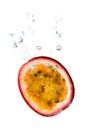 Passion fruit in water with air bubbles Royalty Free Stock Photo