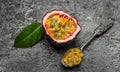 Passion fruits on dark background. Set of whole and half of fresh passion fruit. place for text, top view Royalty Free Stock Photo