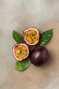 Passion fruits on dark background. Set of whole and half of fresh passion fruit. place for text, top view Royalty Free Stock Photo