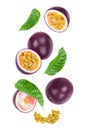 passion fruits and a half with leaves isolated on white background. Isolated maracuya. Top view. Flat lay Royalty Free Stock Photo