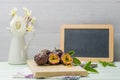 Passion fruits with leaves, knife and white flowers in jar Royalty Free Stock Photo