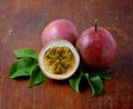 Passion fruits on wooden background Royalty Free Stock Photo