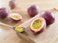 Passion fruits on wooden cutting board Royalty Free Stock Photo