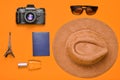 Passion for travel, wanderlust concept. Trip to France, Paris. Felt hat, film camera, sunglasses, passport, perfume bottle, souven Royalty Free Stock Photo