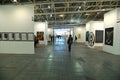 Passionate collectors and emerging artists meet at the international contemporary art fair `Artissima` wearing mandatory face mask
