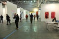 Passionate collectors and emerging artists meet at the international contemporary art fair `Artissima` wearing mandatory face mask