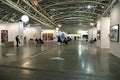 Passionate collectors and emerging artists meet at the international contemporary art fair `Artissima` wearing mandatory face mask