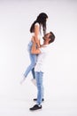 Passionate couple dancing social danse kizomba or bachata or semba or taraxia on white background Royalty Free Stock Photo