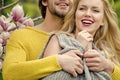 Passionate couple kissing, boy and girl. garden with magnolia flower in spring or summer nature Royalty Free Stock Photo