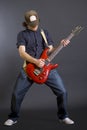 Passionate guitarist with hat Royalty Free Stock Photo