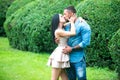 Passionate man gently kissing beautiful woman with desire. Sexy woman touching soft skin of lovers. Young couple having Royalty Free Stock Photo