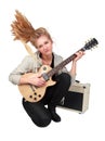 Passionate rock Girl Playing An Electric Guitar Royalty Free Stock Photo