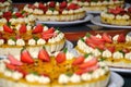 Passionfruit cheesecake with strawberries and mint Royalty Free Stock Photo