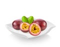 Passionfruits in ceramic plate on white background Royalty Free Stock Photo