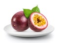 Fresh passionfruits in plate on a white background Royalty Free Stock Photo