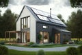 Passive house with solar panels. Green lawn and trees Royalty Free Stock Photo