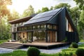 Passive house with solar panels. Green lawn and trees. Setting sun Royalty Free Stock Photo