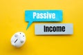 Passive income and investment financial concepts with text and piggy bank