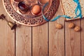 Passover background with matzo, wine and old seder plate.