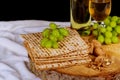 Passover background with wine bottle, matzoh, Royalty Free Stock Photo