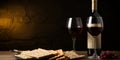 Passover background. Wine glasses and jewish matzah dark background Royalty Free Stock Photo