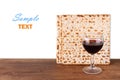 Passover background. wine and matzoh (jewish passover bread) over wooden background Royalty Free Stock Photo