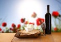 Passover background. wine and matzoh (jewish passover bread) over wooden background Royalty Free Stock Photo