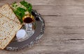 Passover holiday with kosher wine cup, matzah flatbread, a Jewish Pesach attributes Royalty Free Stock Photo