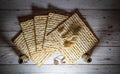 Passover matzos, two candlesticks, dried flowers, and star of David necklace