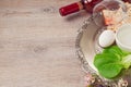 Passover (pesah) background with seder plate, matzoh and wine over wooden background