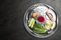Passover Seder plate keara on table, top view with space for text. Pesah celebration Royalty Free Stock Photo