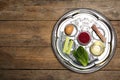 Passover Seder plate keara on table, top view with space for text. Pesah celebration