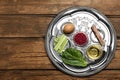 Passover Seder plate keara on table, top view with space for text. Pesah celebration Royalty Free Stock Photo