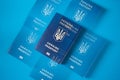 Passport on the background of the Ukrainian Flag