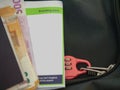 Passport cash money, boarding pass and small lock, travel theme.