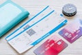 Passport, credit card, tickets on wooden background