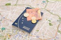 Brazilian passport, euros and map for travel abroad.