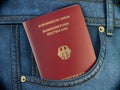 Passport of Germany in pocket jeans. Travel, tourism, emigration and passport control concept