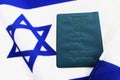 Passport Israel on flag Israel.Booklet cover of Israeli identity card on Flag of Israel.Passport of a citizen Israel