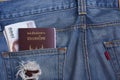 Passport and money banknote in denim jean's pocket Royalty Free Stock Photo