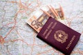 Passport, money and map