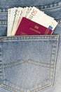 Passport and money in the pocket Royalty Free Stock Photo