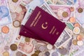 Passport with paper money and coins. Flatlay of vacation on a yellow background Royalty Free Stock Photo
