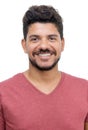 Passport photo of happy laughing latin american man with beard