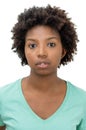 Passport photo of serious african american young adult woman with curly hair Royalty Free Stock Photo