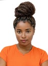 Passport photo of serious young adult black woman with curly hair Royalty Free Stock Photo
