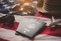 Passport is placed on the US flag. Preparing for a legitimate journey Royalty Free Stock Photo